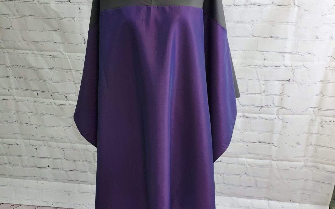 All Purpose Cape Style # 970 in plum color. Large, oversized, comfortable all-purpose cutting and chemical cape for all your salon needs. Snaps at neck for an adjustable fit. Made in USA This is a perfect cape for Balayage!